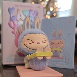 Cute Bunny Action Figure with Blue and Yellow Accents